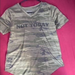 A green camouflage patterned t-shirt